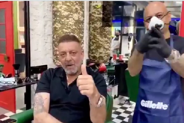 Sanjay Dutt spotted at Aalim Hakim saloon says he will beat cancer