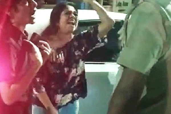 Women assistant director fights with police
