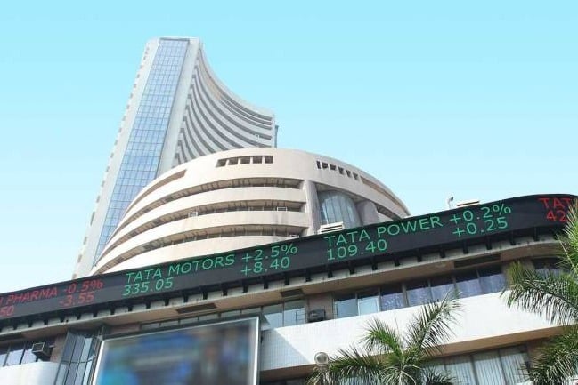 Sensex ends 748 points high