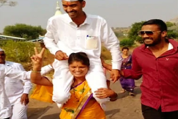 Woman carries husband on shoulders to celebrate panchayat polls victory