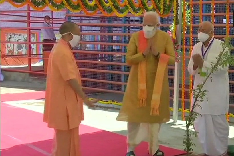 Prime Minister Narendra Modi plants a Parijat sapling