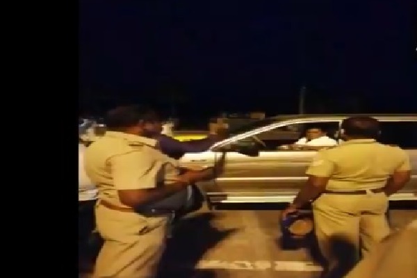 Former MP K Arjunan hits a police personnel on duty near Salem check post 