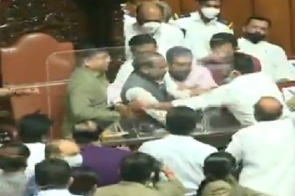   Congress MLCs in Karnataka Assembly forcefully remove the chairman  
