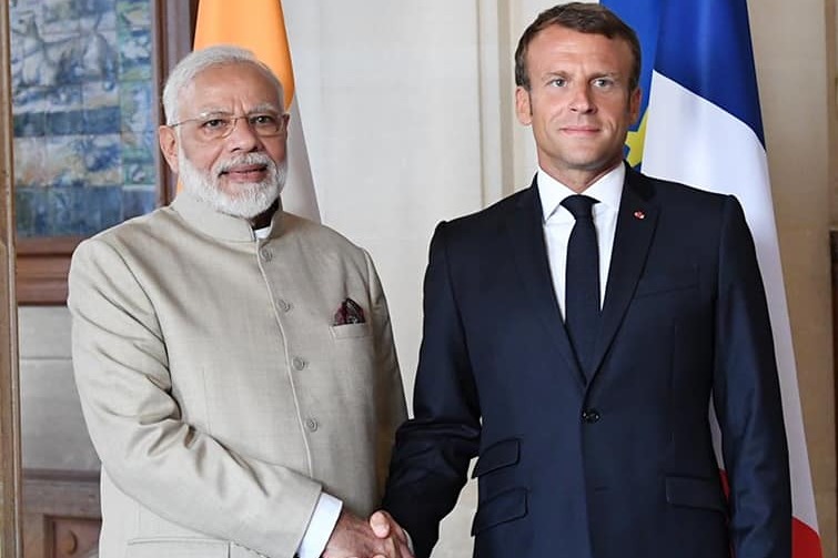 PM Modi send message to France president in French language 
