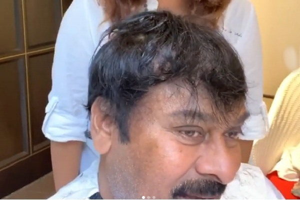 Susmitha cuts hair to his father Chiranjeevi