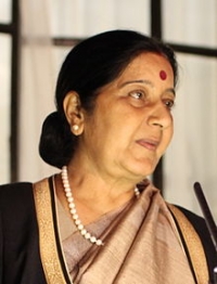 Sushma walks into Lok Sabha amid thumping of desks
