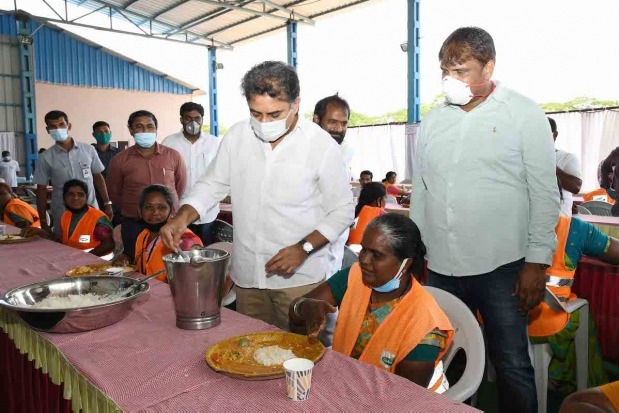 KTR joins Sanitation workers for lunch