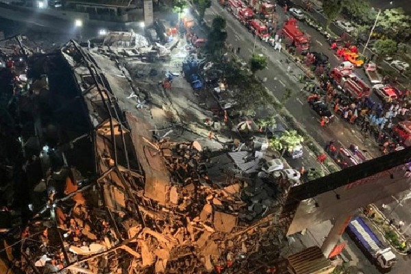 Dozens trapped as China Corona Hotel Collapsed