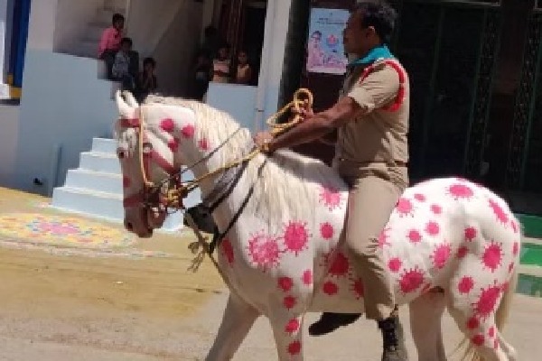 Andhra Pradesh Sub Inspector Maruti Sankar painted with images corona