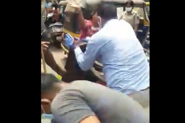  A scuffle broke out between a hawker and police personnel