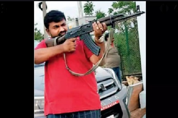 Hyderabad corporators husband holds AK 47 