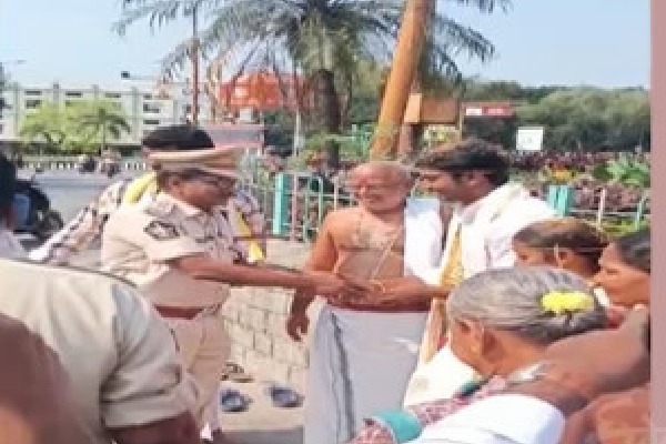 Police officers attend a marriage at Alipiri