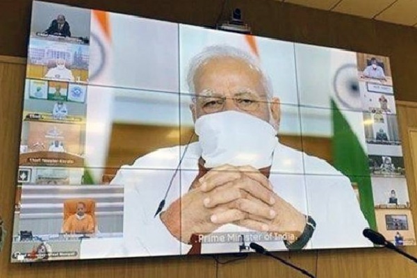 PM Narendra Modi uses homemade face mask during CMs meeting on Covid19