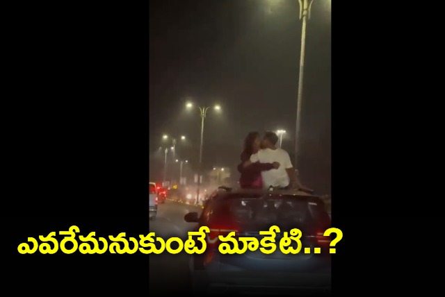 Couple Openly Kisses From Moving Car Roof During Night Drive in Hyderabad