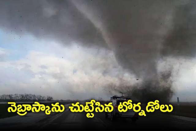 powerful tornado sweeps across us highway in nebraska