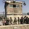 Kabul airport gates closed after deadly bombings, crowds cleared