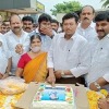 Minister Appalaraju cuts the cake during the launch of Sridevi Soda Center
