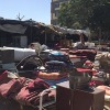 People sell household items alongside Kabul streets  