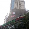 Global cues, volatility pull equity indices down, banking stocks slip