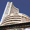 Sensex closes 958 points high