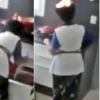 Women head caught fire in kitchen and she did not realize it