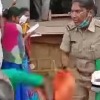 Women SI throws women farmer on the ground