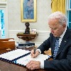 Biden signs short-term bill to raise debt limit