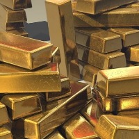 devotee gives gold biscuits for ttd