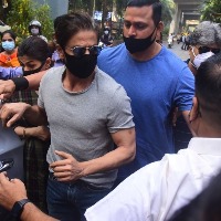 SRK goes to receive son, Juhi Chawla stands surety