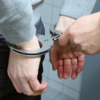 UP school principal arrested for dangling child from balcony