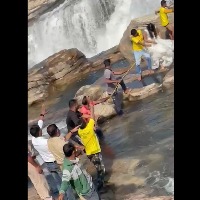 Couple gets stuck in waterfall during pre-wedding shoot, video goes viral