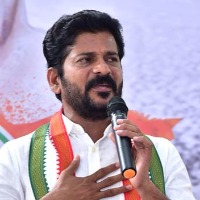 Four men from Gujarat trying to occupy the nation says Revanth Reddy