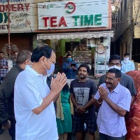 Vice President of India Venkaiah Naidu appreciates a tea shop owner in Vizag