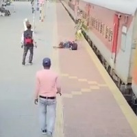 Hero Cop Saves Woman From Falling Under Train In Bengal