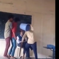 students attack teacher 