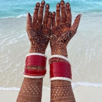 Katrina shares glimpse of beachy honeymoon, shows mehendi adorned hands