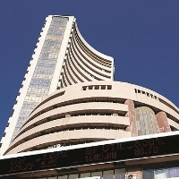 Sensex ends 612 points high