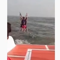 Two women falls into sea while parasailing