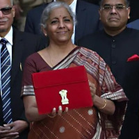 On day of Budget 2022 Nirmala Sitharaman chooses rusty brown saree