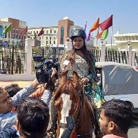 lady mla takes horse ride to assembly