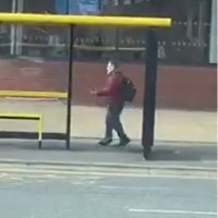 Man Dances In Bus Stop While Waiting For A Bus