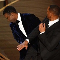 Will Smith slaps Chris Rock on Oscars stage
