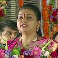 Roja takes oath as minister