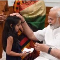PM Modi gets mesmerizes during a child reciting Aigiri Nandini