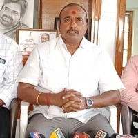 janasena pac member pitani balakrishna demands sorry from minister chulluboina venugopalakrishna