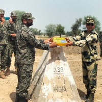 Sweets exchanged by India and Pakistan border security forces on Ramadan day