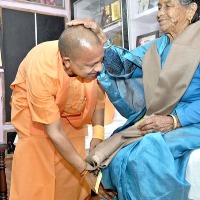yogi adityanath taken blessings from mother