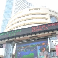 Sensex looses 1416 points