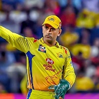 Dhoni says cricketers should be proud of district cricket