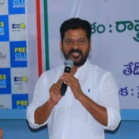 15 departments are in hands of 4 IPS officers says Revanth Reddy